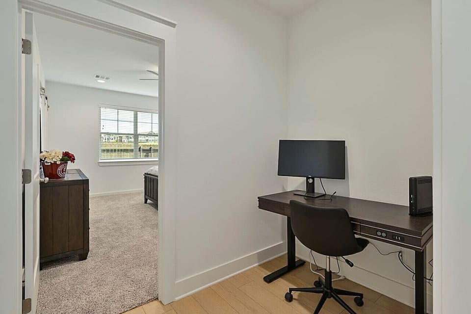 Office nook included in the hallway space before entering the master bedroom