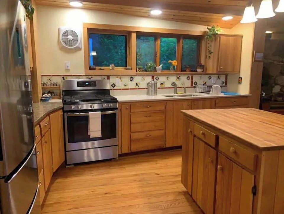 Updated kitchen with gas stove and lots of room to cook.