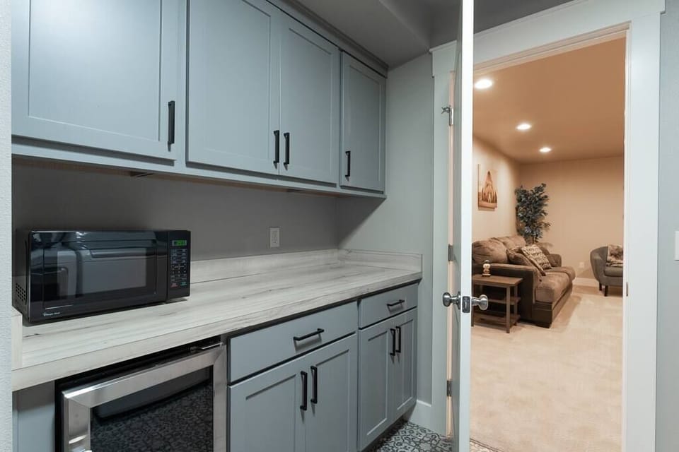 Microwave for the popcorn, wine cooler if that's your style and lots of space! (this is inside the laundry room, next to the downstairs theater & game room!