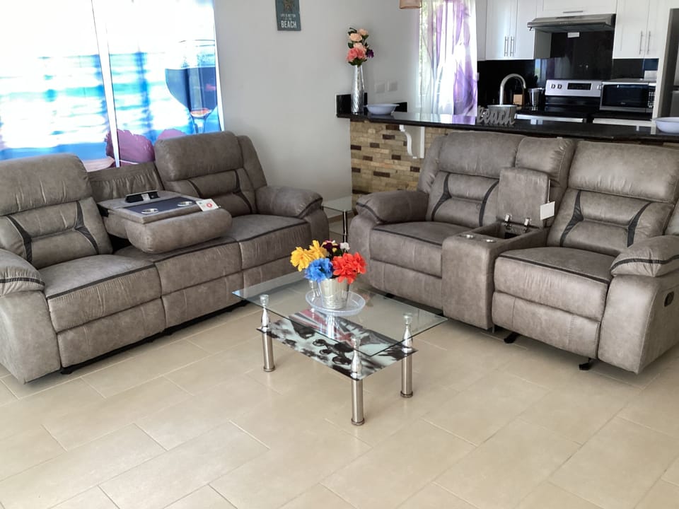 Leather sofa with cell phone charging 