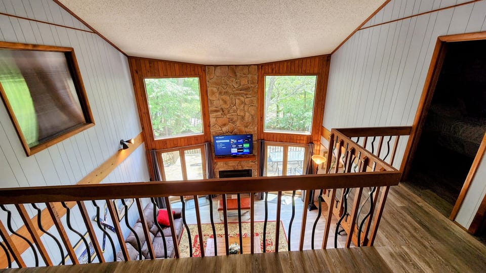 View looking down over part of living room