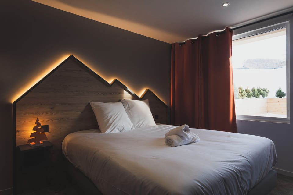 Drift to sleep in the double bed after a wonderful day outside.