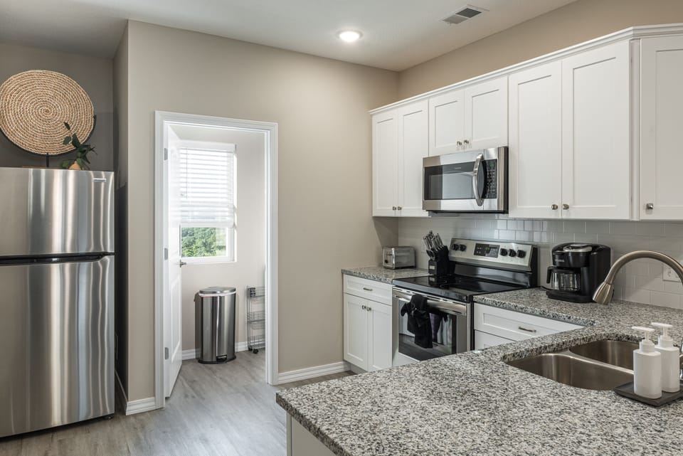 Main Floor: Fully Stocked Kitchen