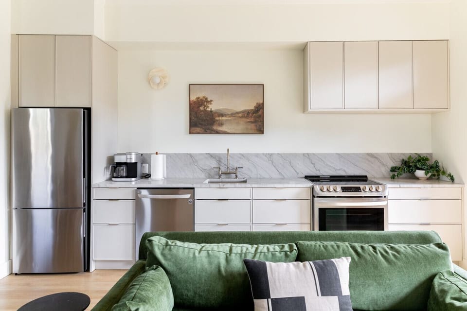 Spacious living room that opens up into the kitchen. The couch turns into a sleeper sofa. HD TV with cable and all the apps you could want. Private patio, that faces Belmont University, with seating for 2.