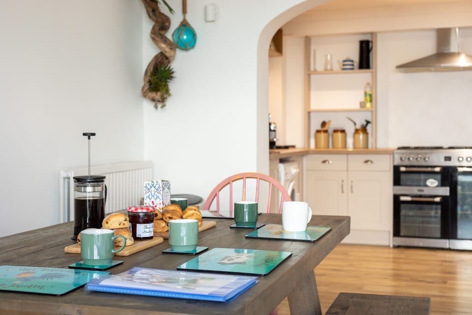 Open modern fitted kitchen leading to dining area
