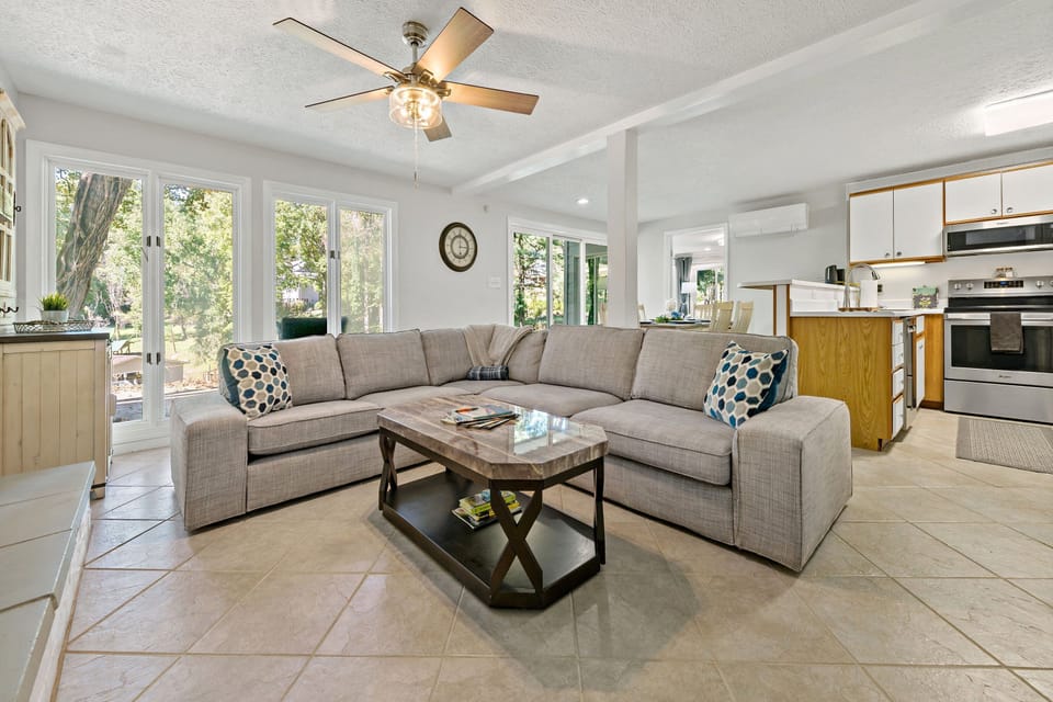 Lower level living area open to dining area and kitchen