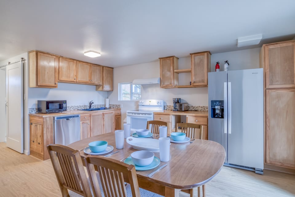 Kitchen with latest amenities and dining area