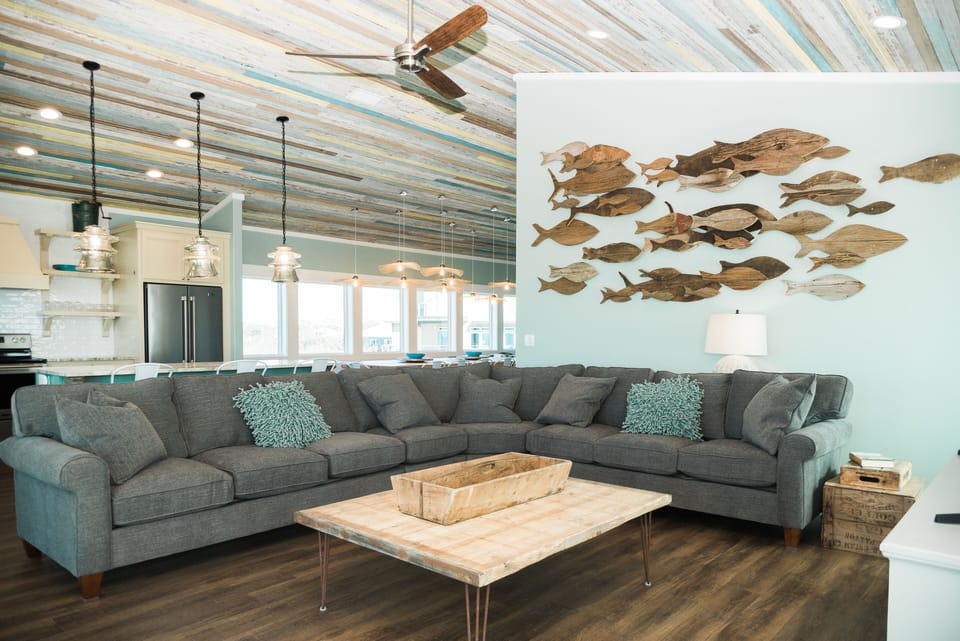 Third-floor living space with smart tv and gulf views