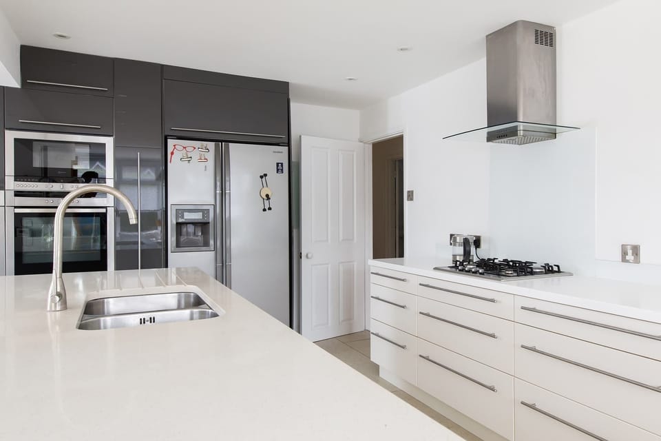 You have plenty of cupboard space and a huge American fridge freezer.