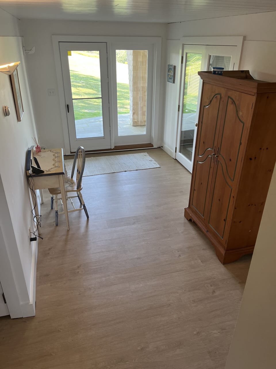 Main house , First Floor Desk and Armoire, Door to outside.