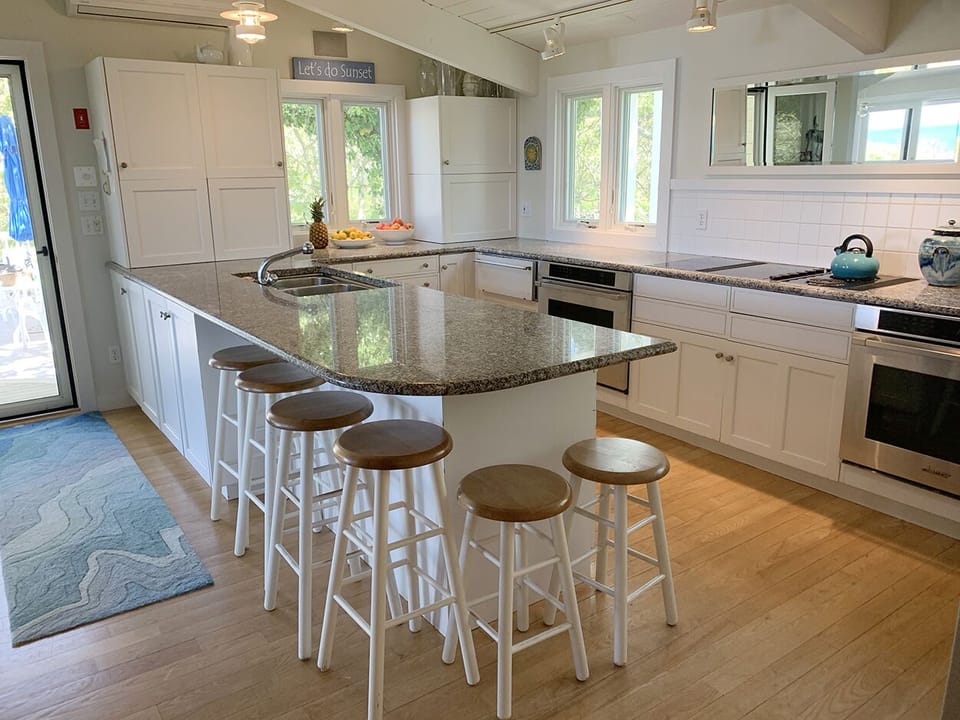 Main House Kitchen, door out to large deck.