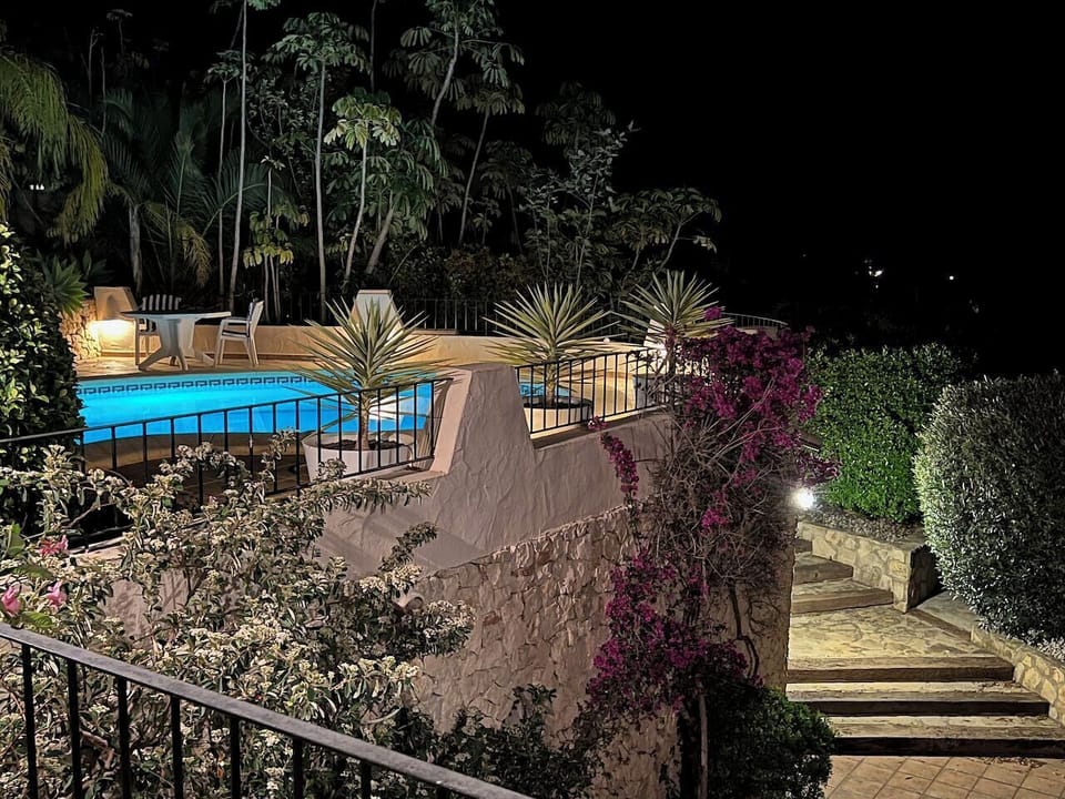 Swimming pool at night from the Naya