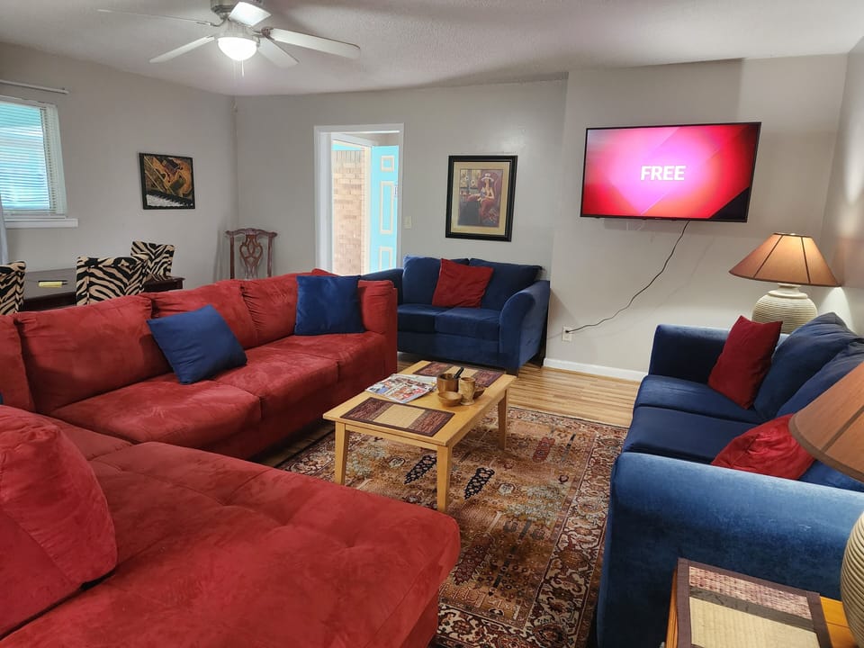 spacious living room with smart tv