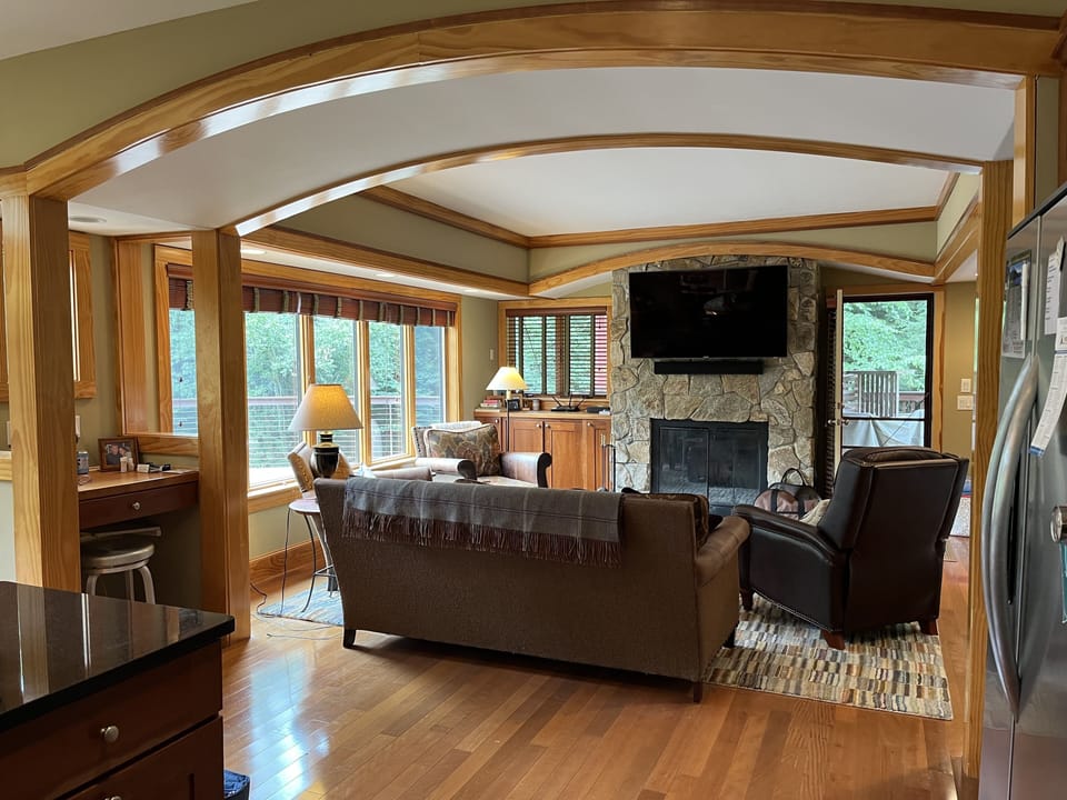 First floor family room with wood burning fireplace