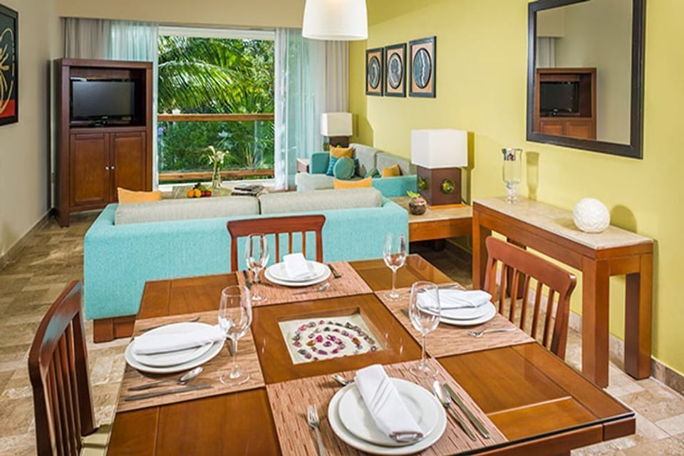 I Bedroom Suite with dining room table in living room.  Balcony - Beautiful view