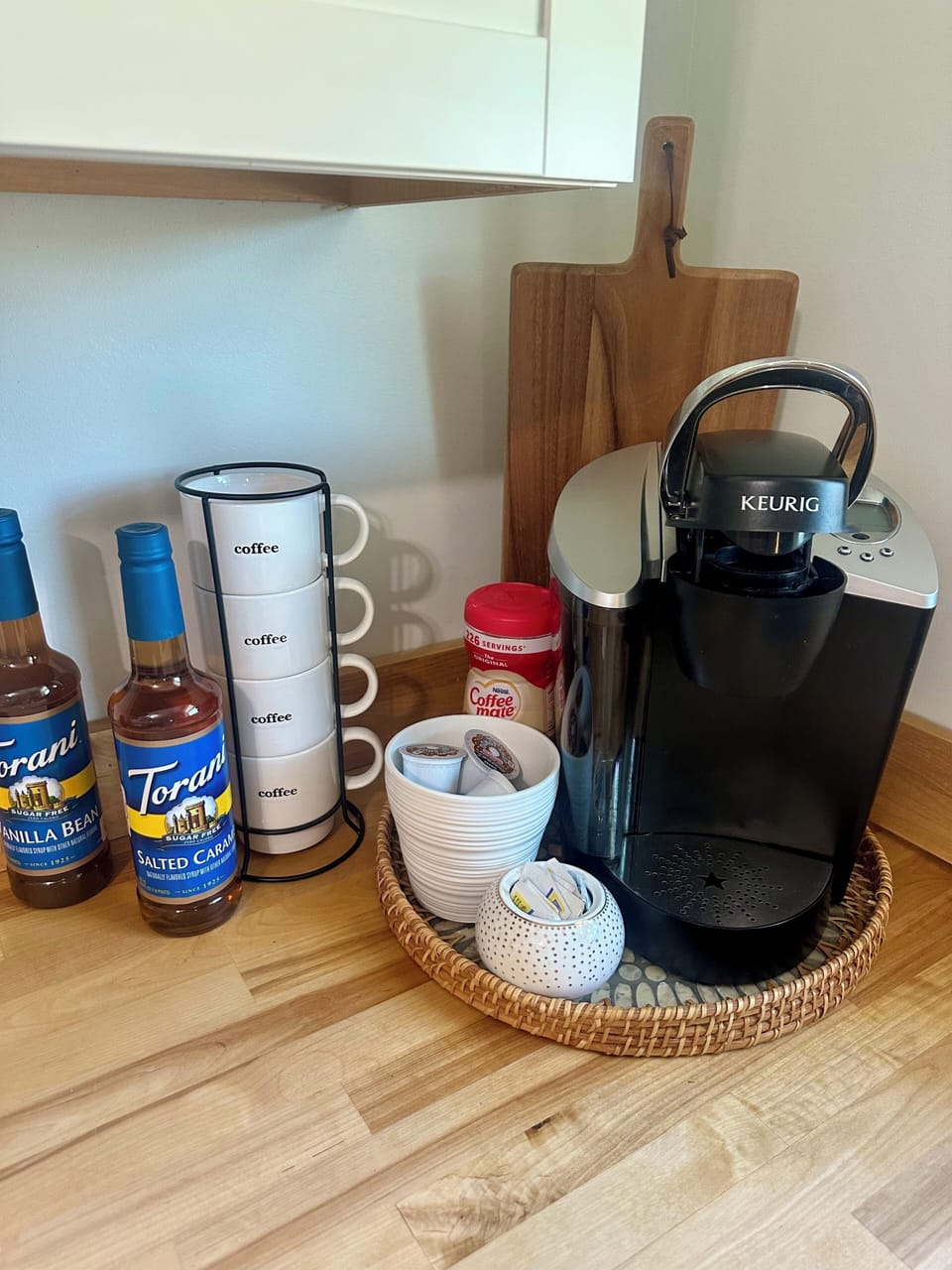 Kuerig with coffee pods and creamers for your convenience 