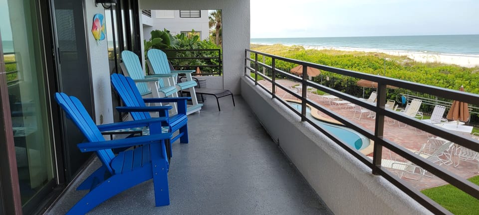 Main Balcony to beach view, a front seat to amazing sunsets.