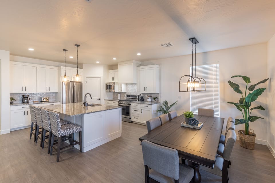 View of Dining Room - With an open and spacious floor plan, the Dining Room and Kitchen can accommodate meal preparations for groups large or small.