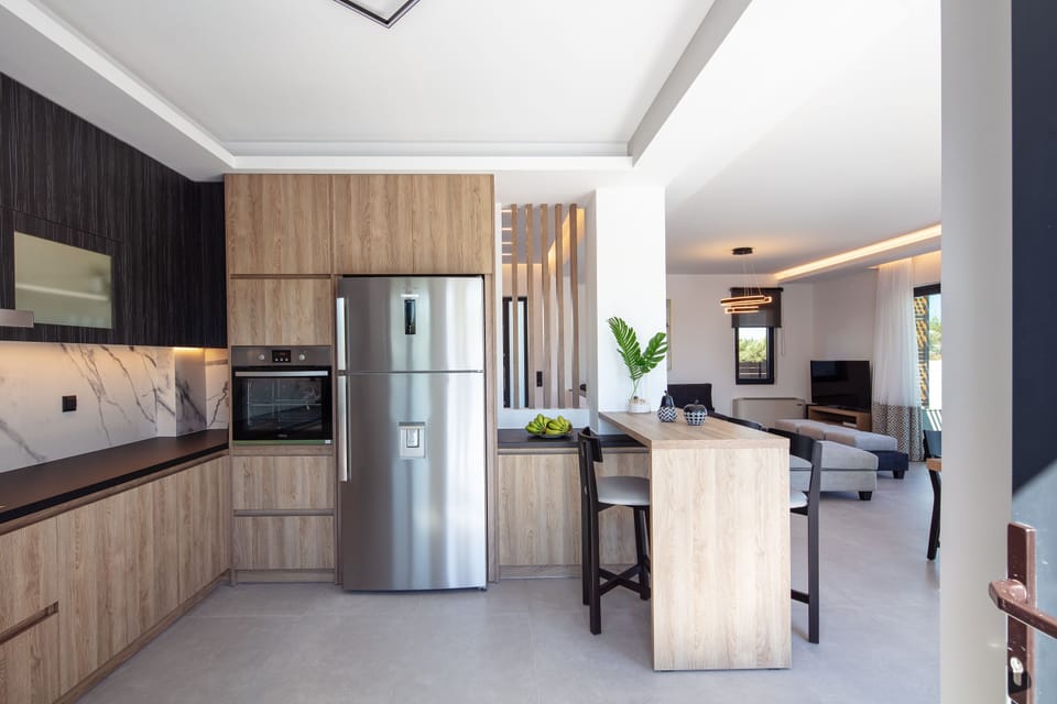 The open plan kitchen-dining area. 