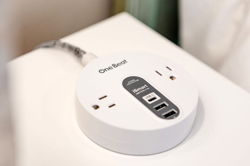 Charge your devices in both primary and queen guest rooms