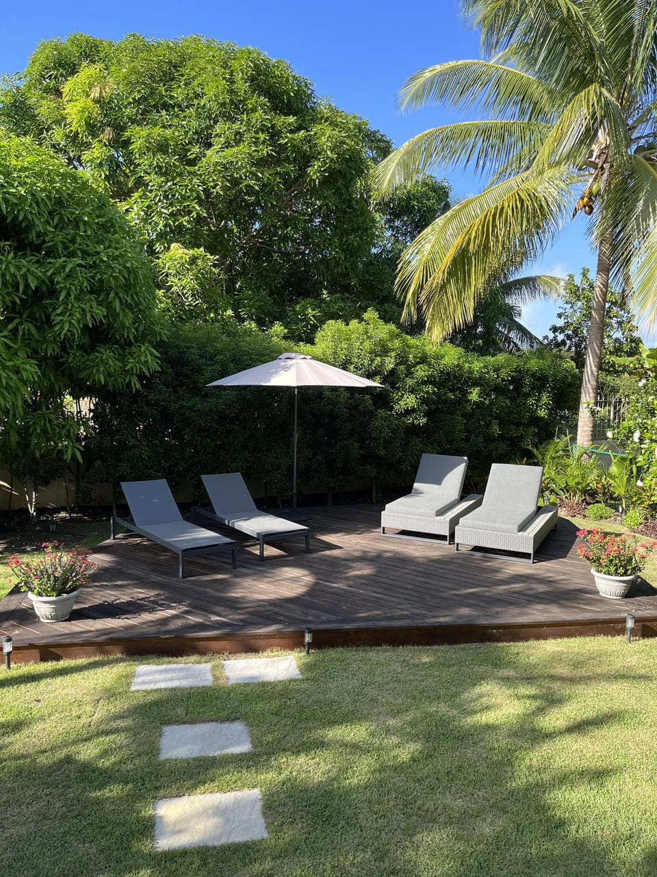 Elevated deck, new landscaping and loungers
