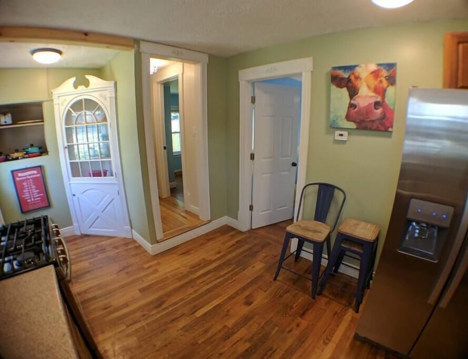 Entrance to Bedroom #1, hallway and Bedroom #2 off hallway.