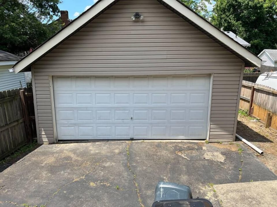 Garage behind house