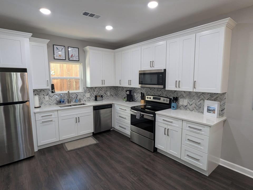 The open concept kitchen allows the chef to interact with guests.