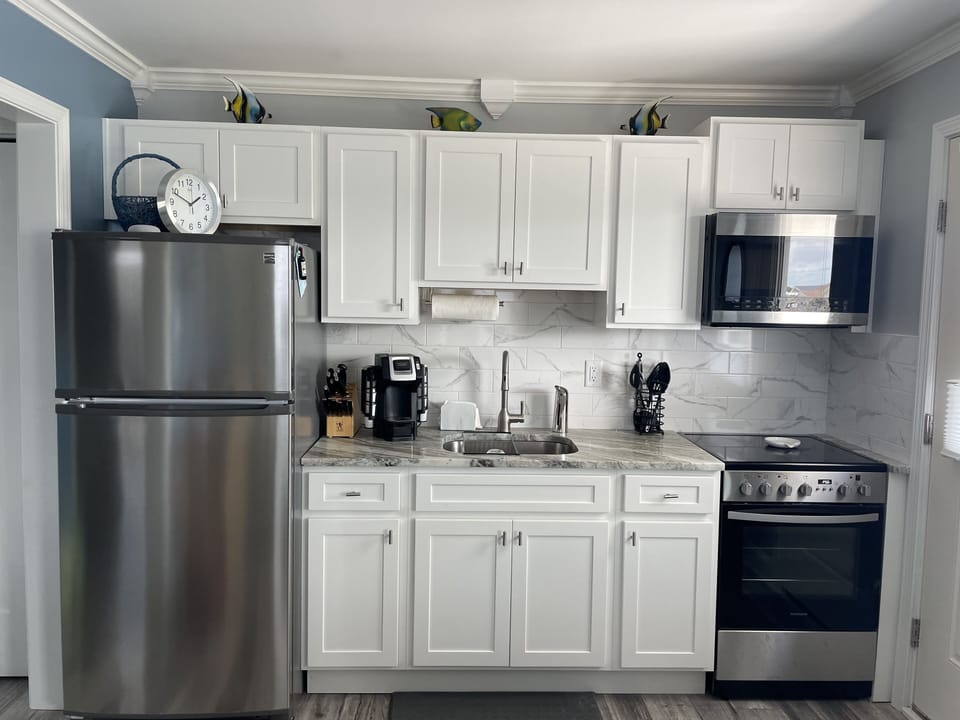 Fully equipped kitchen with cookware, silverware, glassware. Keurig coffee on us