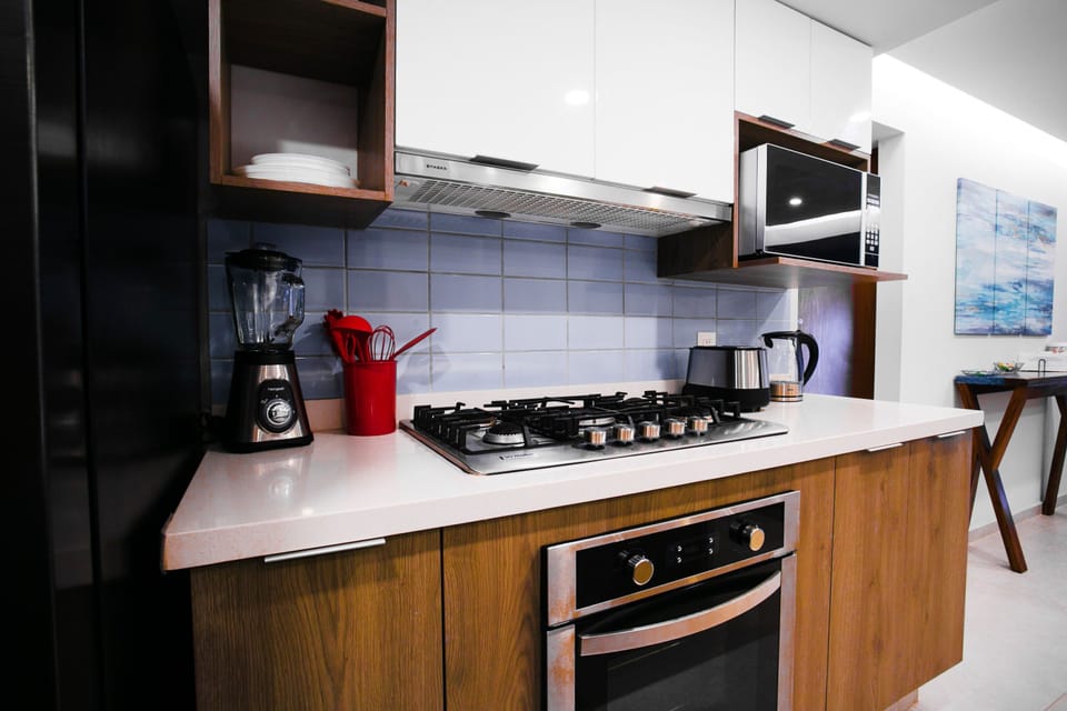 Kitchen amenities include a microwave, toaster and coffee maker