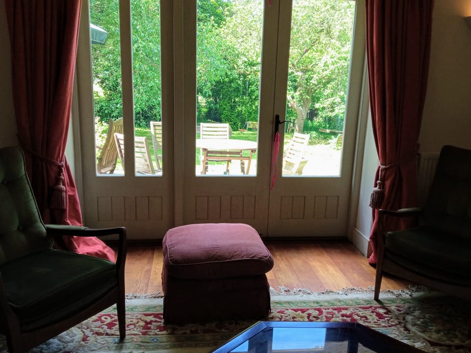 French doors opening onto private patio, into private garden.
