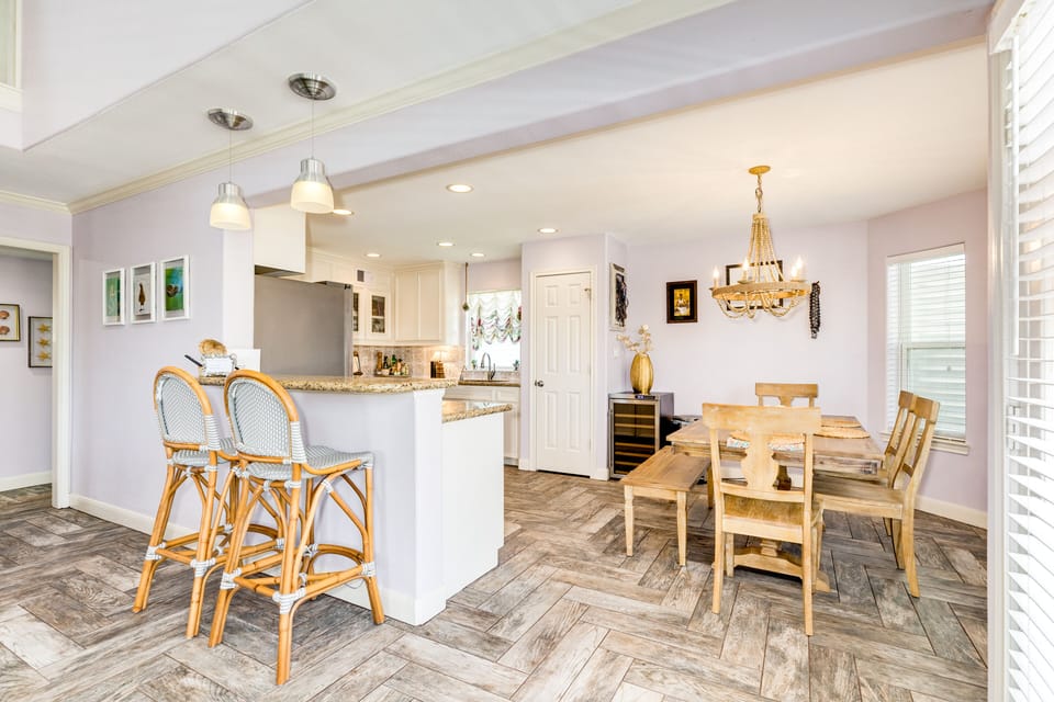 Grab a quick snack at the adjacent breakfast bar seating 2