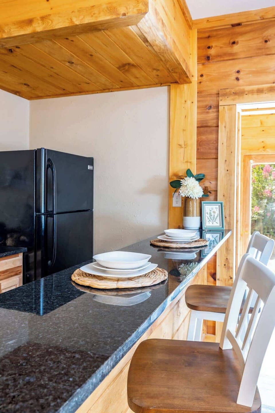 Our kitchen has some bar top seating for enjoying a snack or drink while you wait for dinner!