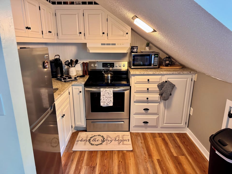 Renovated kitchen w/ SS appliances. Completely turn-key & inviting!