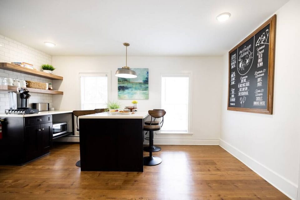 Following the hallway further to the right, you will find the Parsonage full kitchen that has everything you need to prepare a meal.