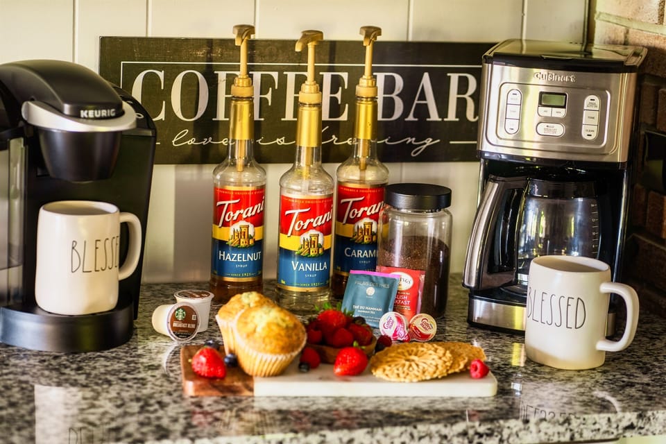 Let the aroma of fresh coffee and tea awaken your senses. Our coffee bar comes equipped with keurig & a drip coffee makers, freshly ground coffee, creamers and teas.