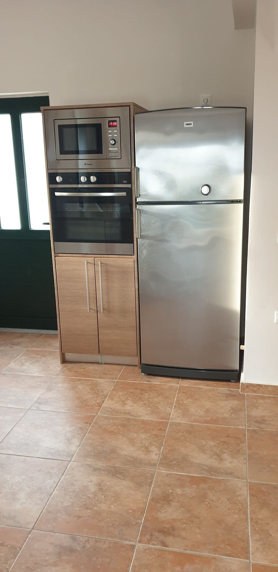 Oven, fridge-freezer and microwave