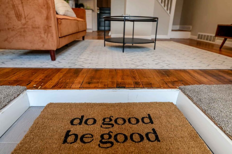 Start your stay with positive vibes—our welcome mat reminds you to 'Do good, be good' every time you step in
