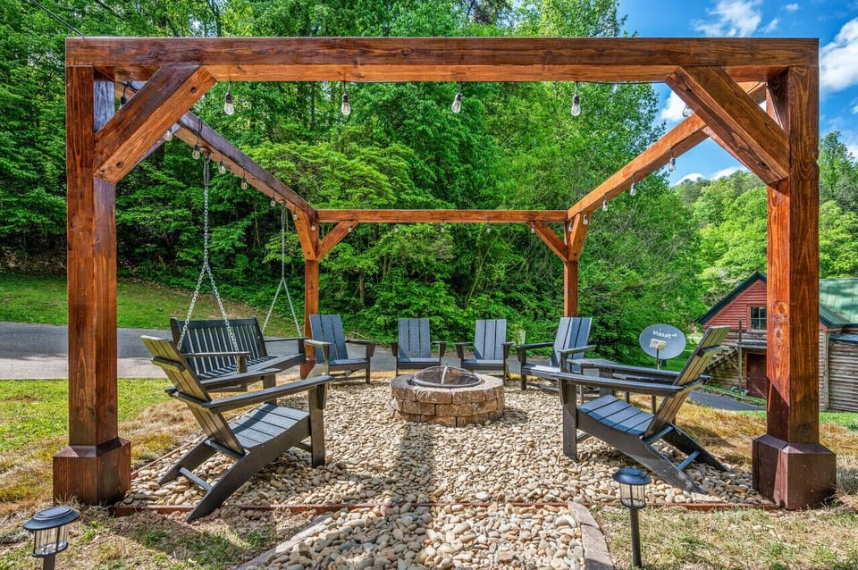New 8-person fire pit area! Polywood furniture and swing bench. Very cozy!