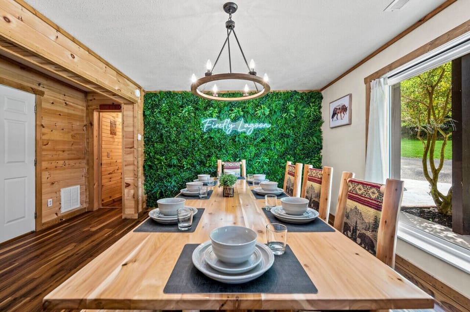 Say hello to family dinners! Dining room with custom made dining table, and an accent wall for the best selfies.