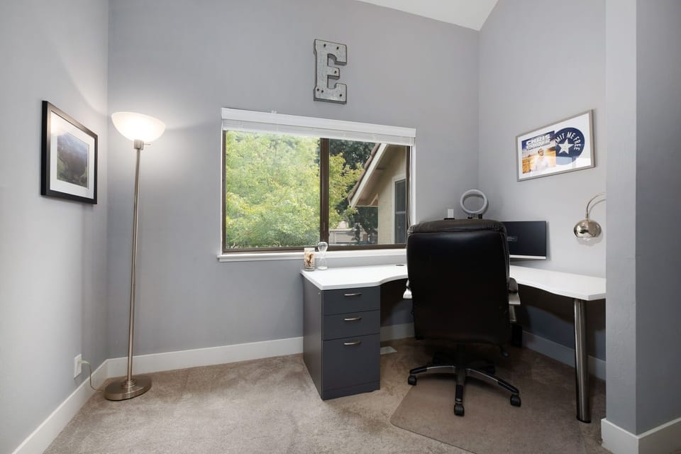 2nd Floor: Home office loft with beautiful outdoor views. Open concept feel.