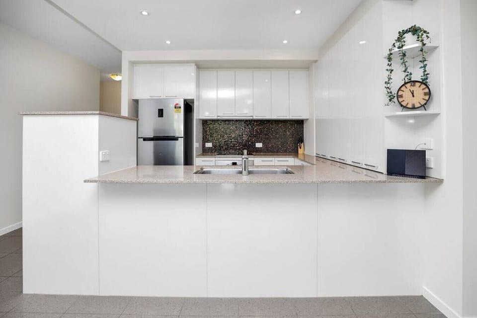 Kitchen: Modern elegance awaits with sleek appliances and stylish finishes to inspire your culinary adventures!