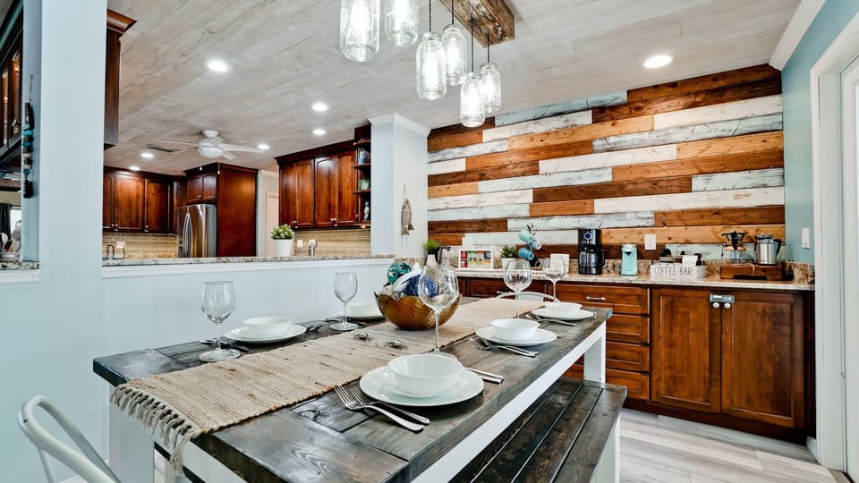 Dinning area with seating for 8. French doors that lead out to lanai. 