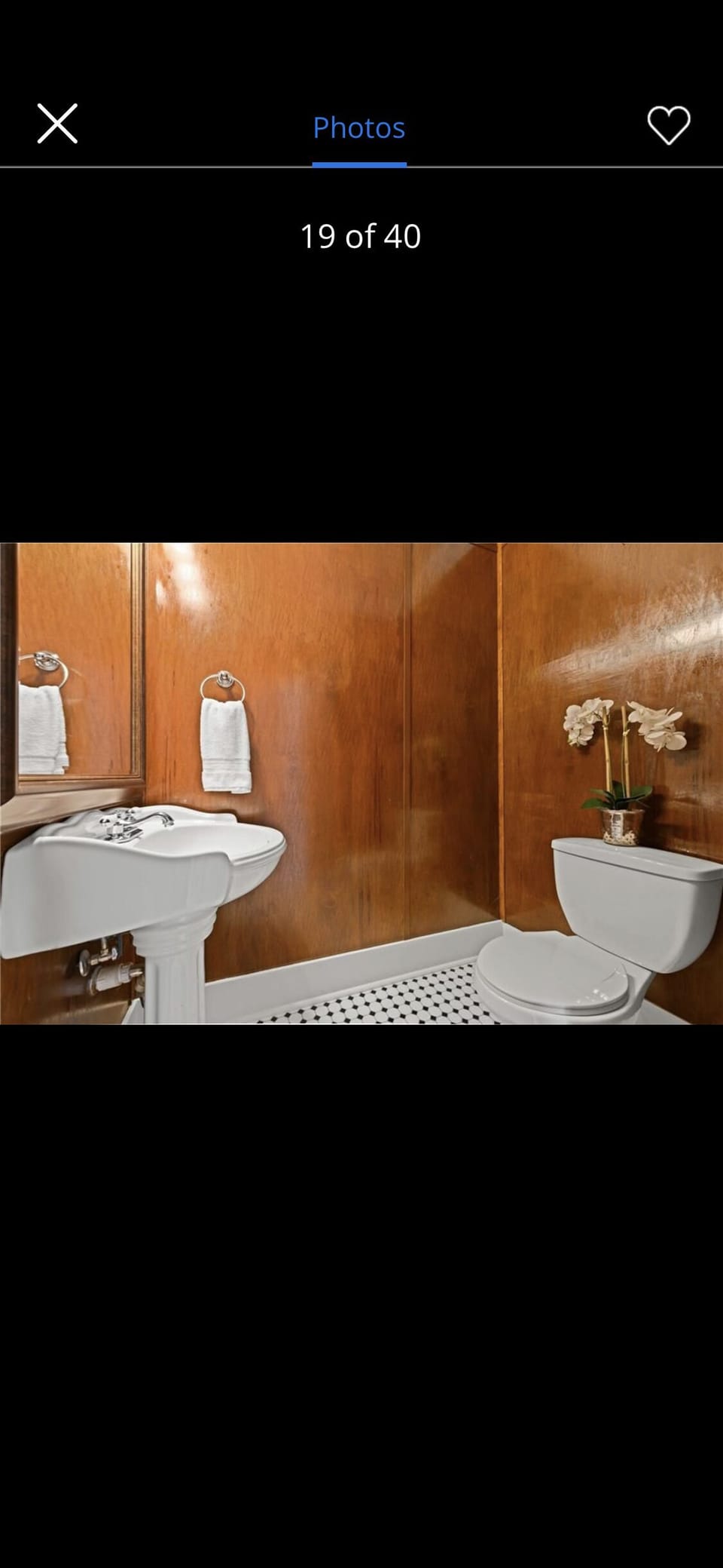Half bath off of Living Room and Parlor
