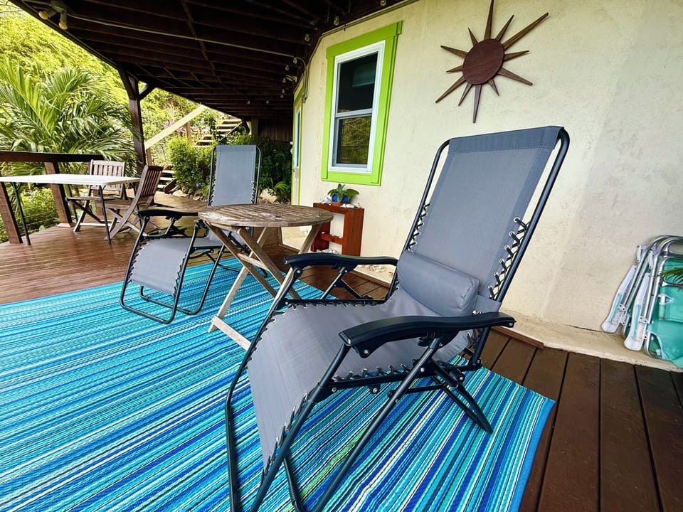 Kick back in the afternoon shade with a book and a drink for a siesta.