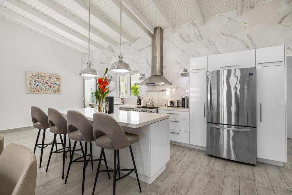 You'll never want to leave your gorgeous villa with its modern décor, stainless steel appliances, and kitchen island!