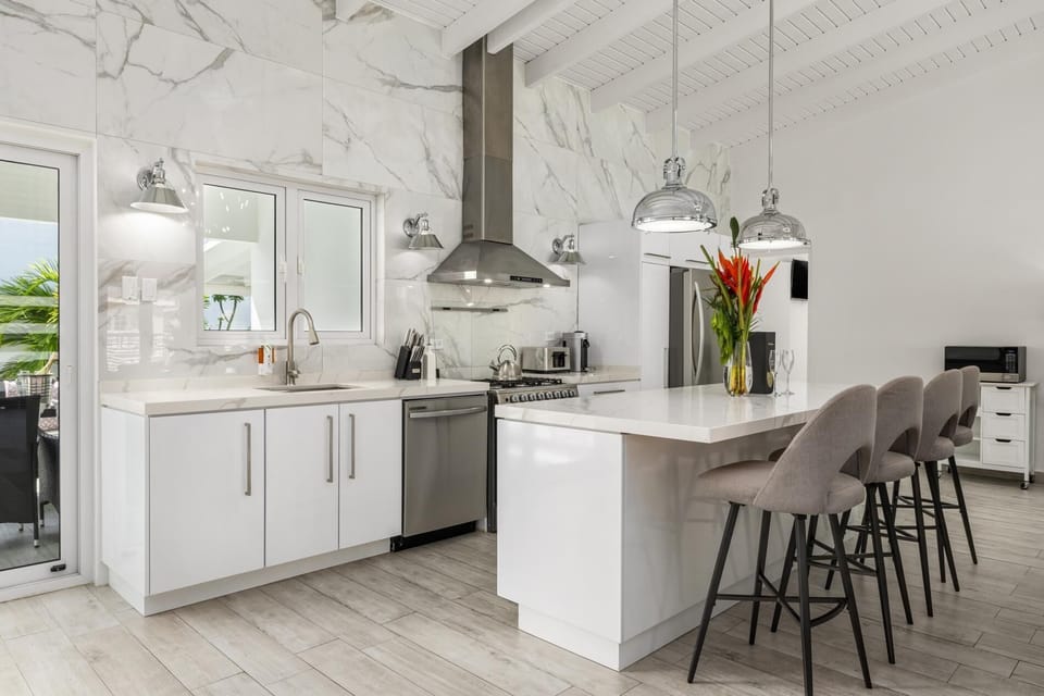 You'll never want to leave your beautiful island vacation home with its modern décor, stainless steel appliances, and kitchen island!