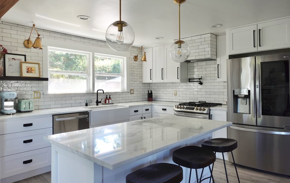 Open kitchen with plenty of cooking supplies and appliances!
