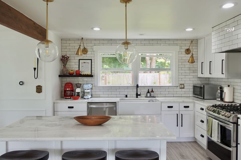 Kitchen overlooks the backyard.