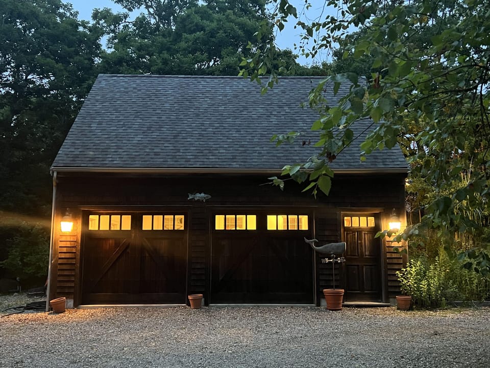 2-car garage with queen bedroom above